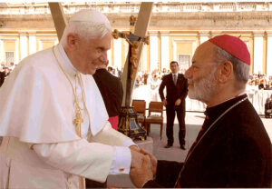 His Holiness Pope Benedict XVI and His Lordship Bishop Francis Micallef exchange greetings in St. Peter's Square. Bishop Micallef was on a visit to Rome in May 2005.